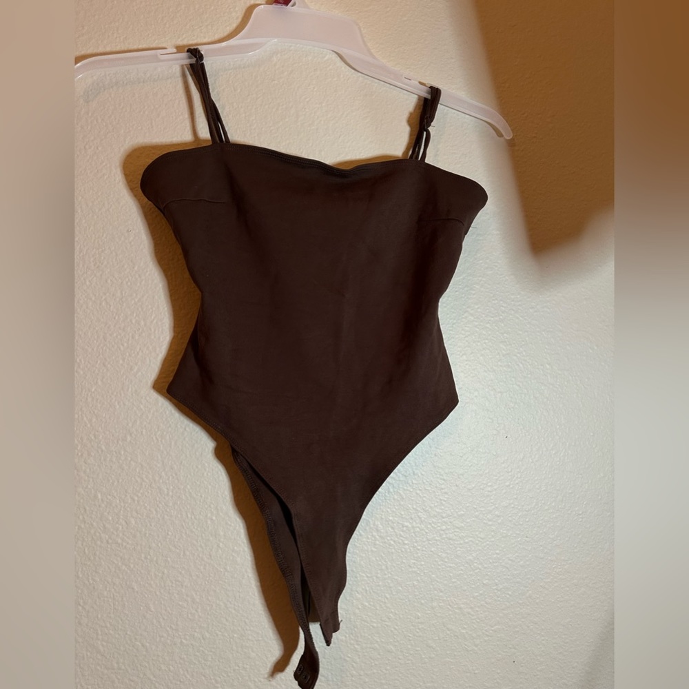 Brown shinestar body suit (S)